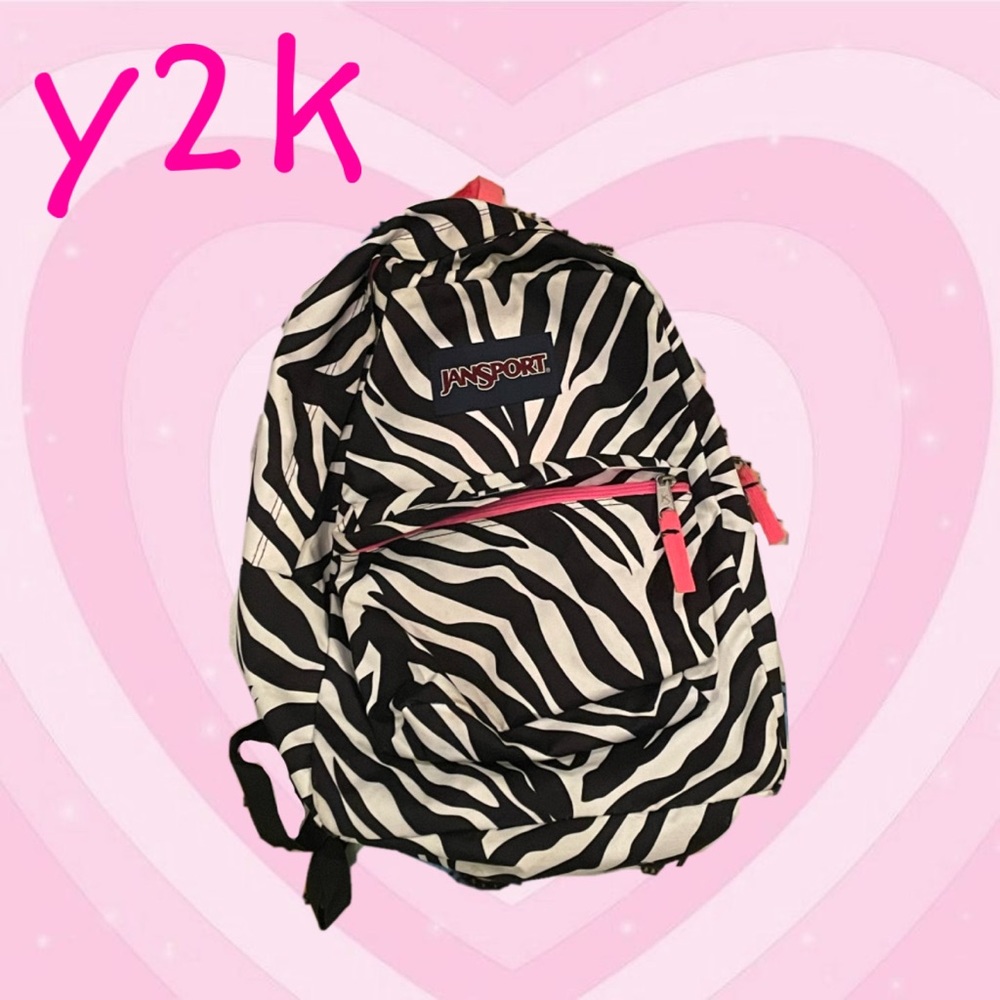 jansport zebra backpack with pink accent